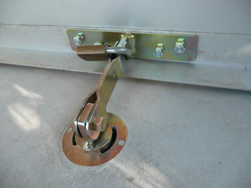 Roller door anchor in use