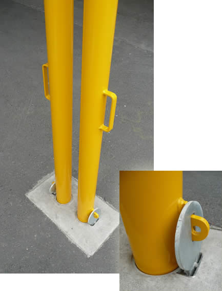 Close-up of in-ground sleeve and storm barrier bollard in postion